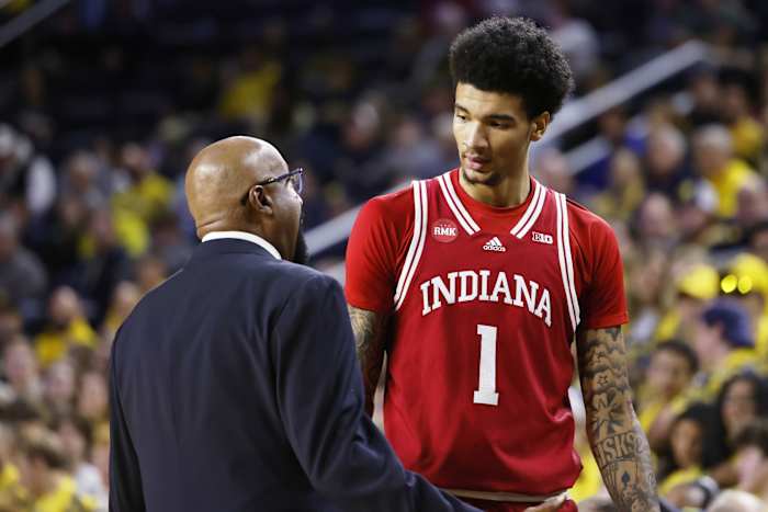 Indiana Hoosiers head coach Mike Woodson talks to center Kel'el Ware (1) in the first half against the Michigan Wolverines at Crisler Center.